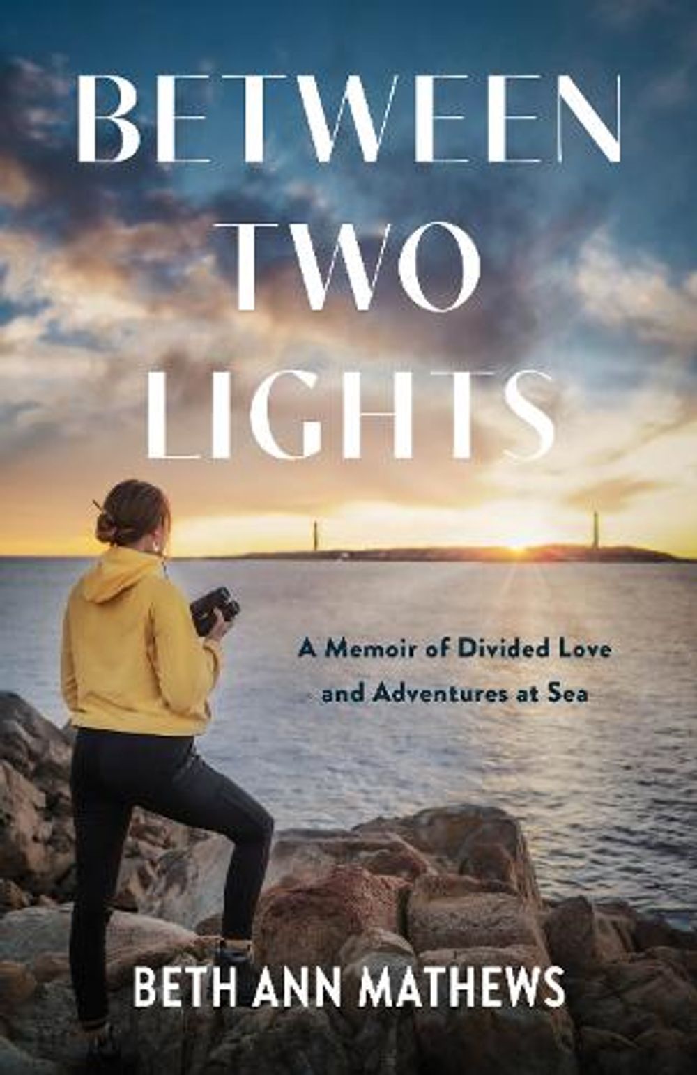 Between Two Lights by Beth Ann Mathews - ISBN: 9798896361367